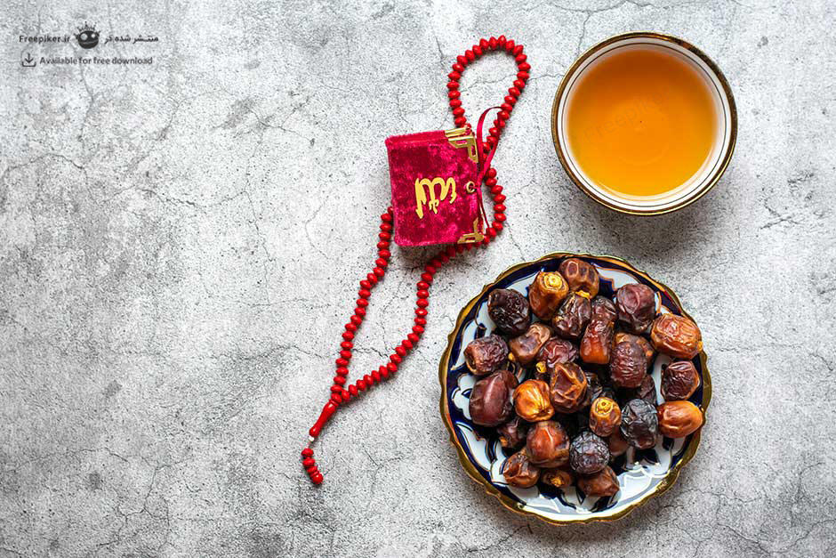 تصویر کاسه خرما و قرآن برای استفاده در پست های ماه رمضان